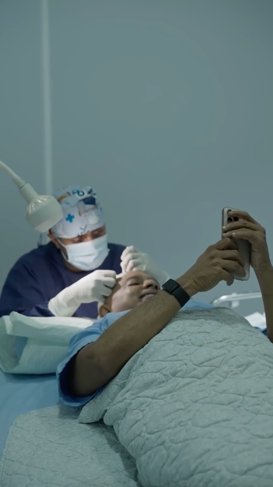 DHI-certified surgeon performing a hair transplant procedure